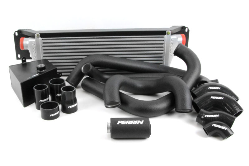 Front mount intercooler kit for 2015-2021 STI, featuring intercooler, hoses, and mounting hardware.