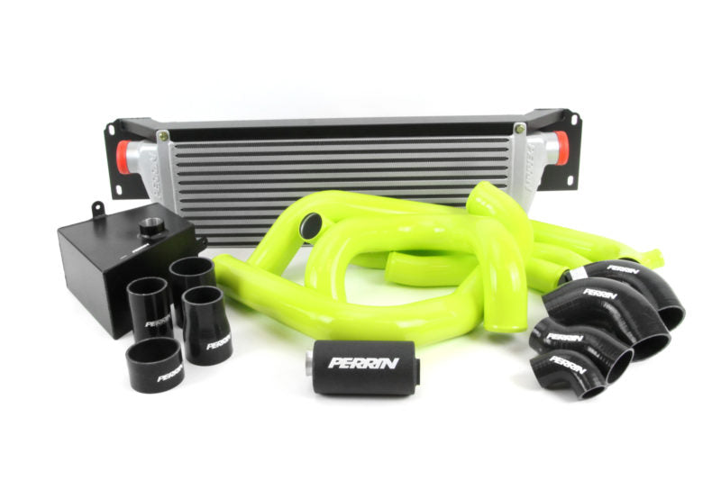 Front mount intercooler kit for 2015-2021 STI featuring a large core, bright green piping, and black components.