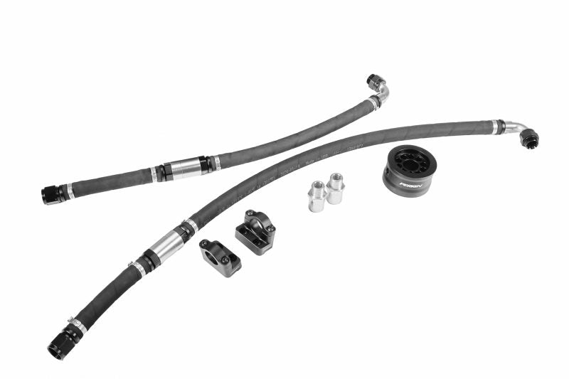 Oil cooler relocate kit featuring hoses, fittings, and mounting brackets for improved engine cooling performance.