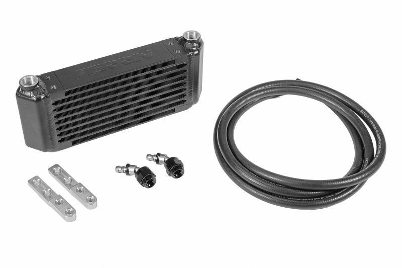 Transmission oil cooler kit for 2013-2025 Crosstrek with CVT, including cooler, hoses, and mounting hardware.