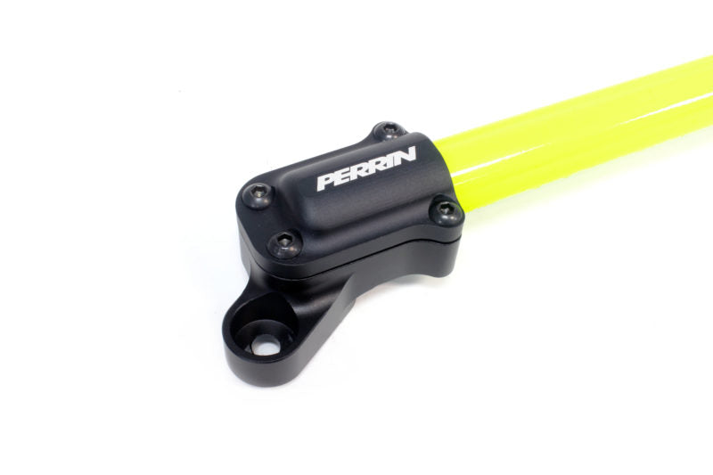 Perrin strut brace for BRZ/FR-S/86/GR86 featuring a bright yellow bar and black mounting hardware.
