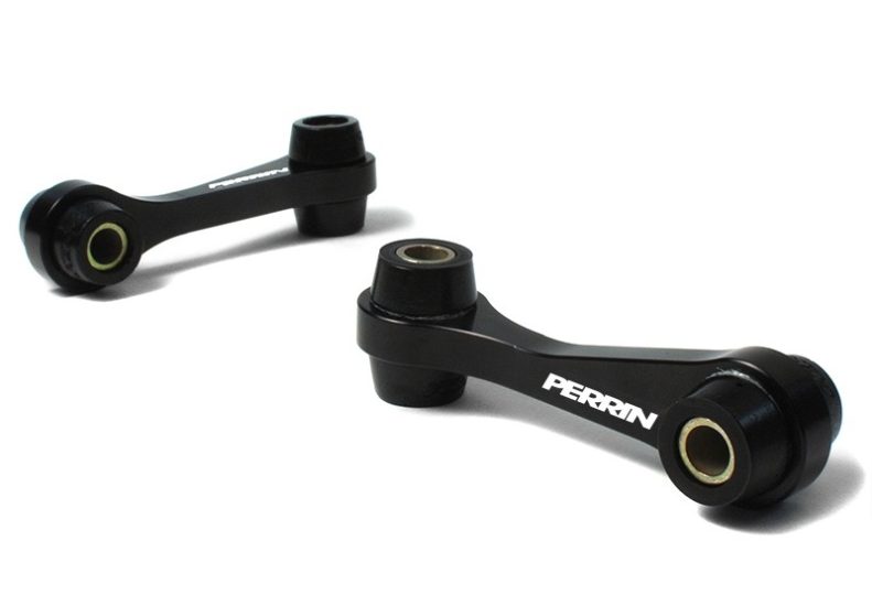 Perrin rear endlinks with polyurethane bushings designed for WRX and STI, featuring a sleek black finish.