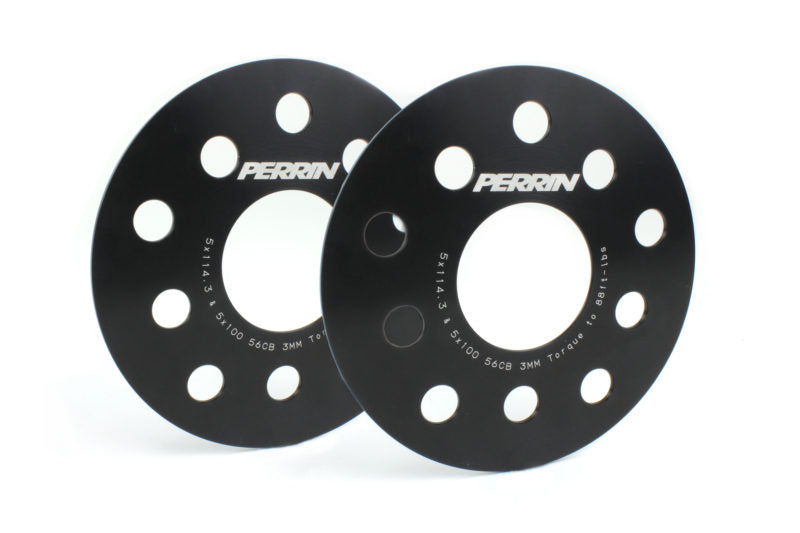 Black 3mm Subaru wheel spacers with multiple holes for bolt fitting, designed to enhance vehicle stance and performance.