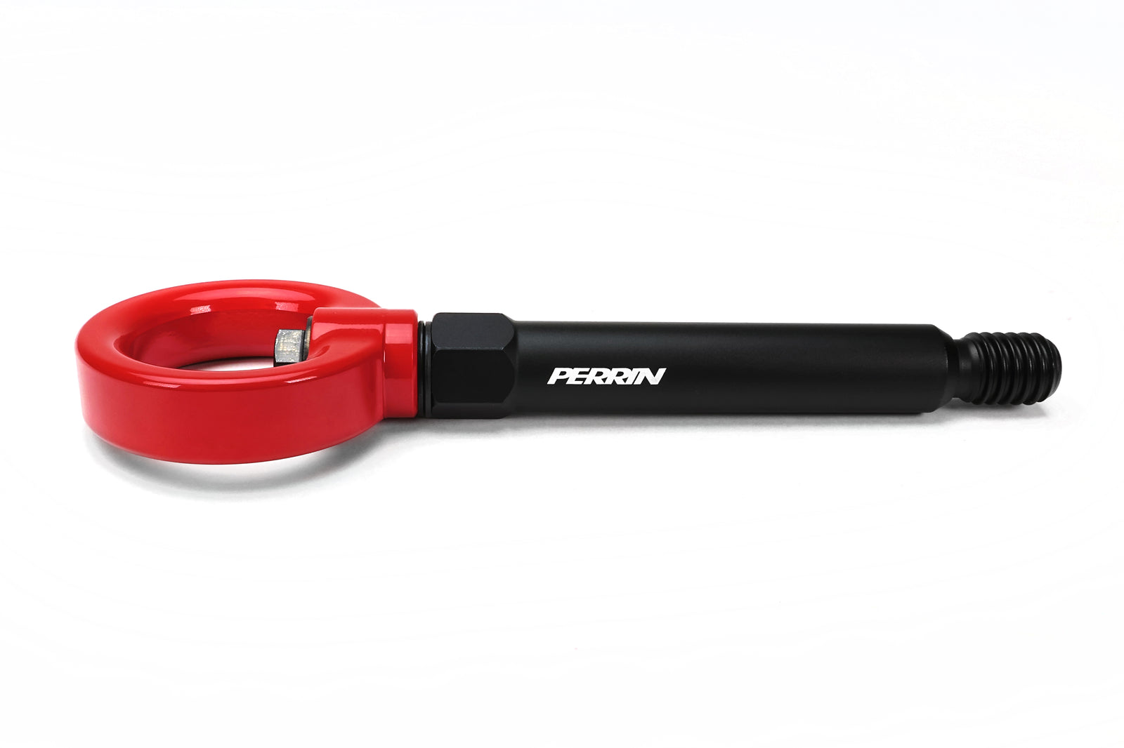 Close-up view of PERRIN rear tow hook for GR Corolla displaying precision fitment and red anodized finish.
