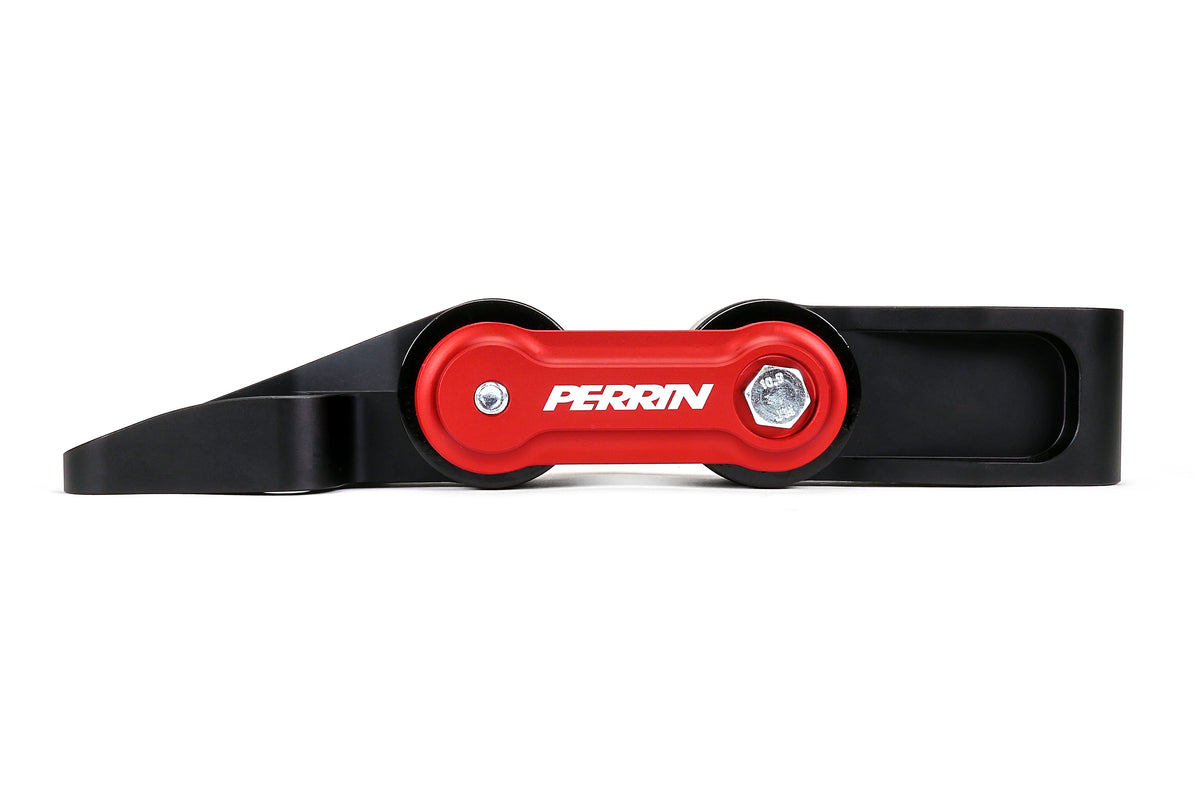 PERRIN Pitch Stop Mount for GR Corolla in black and red, front view of PERRIN logo, fasteners, and bushings