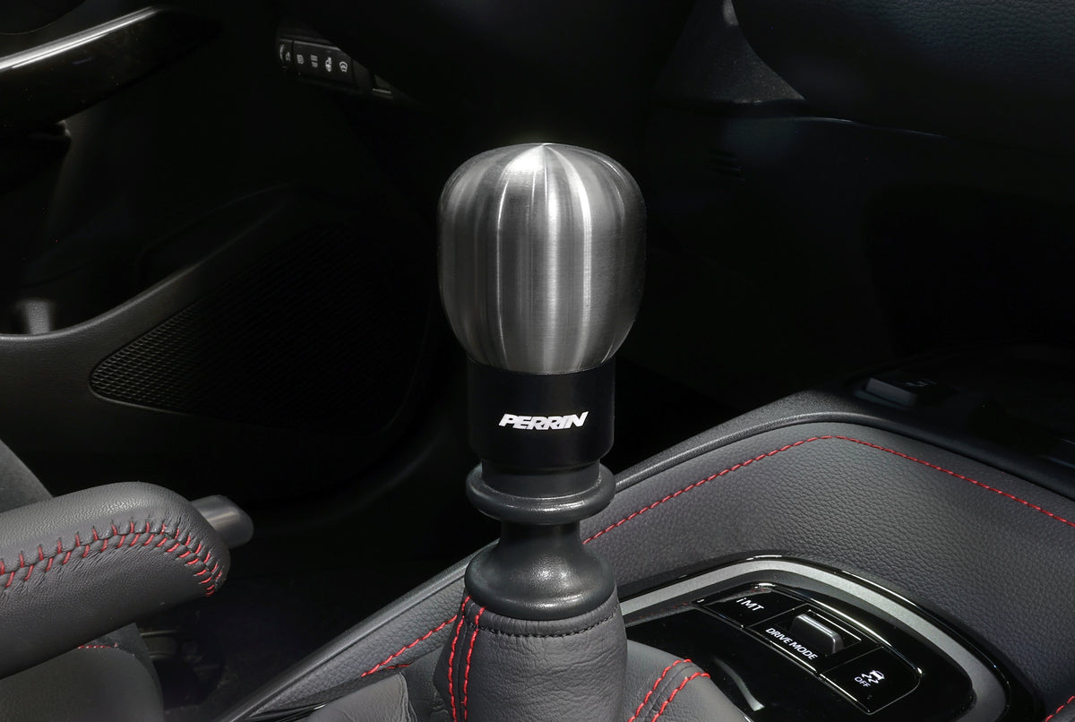 A PERRIN heavy weight stainless steel shift knob installed on a GR Corolla.