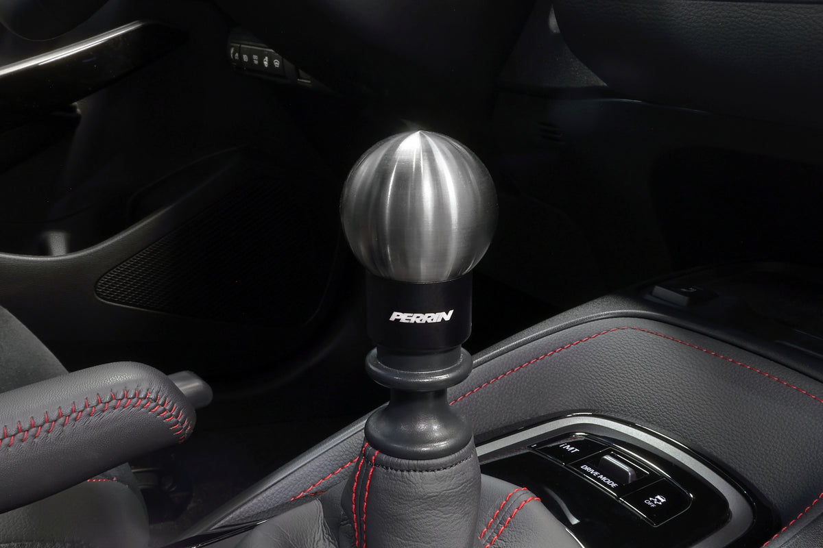 A PERRIN heavy weight stainless steel shift knob installed on a GR Corolla.