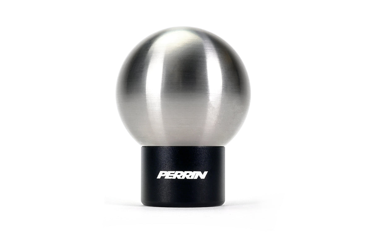 A PERRIN heavy weight stainless steel shift knob with PERRIN logo on shifter adapter.