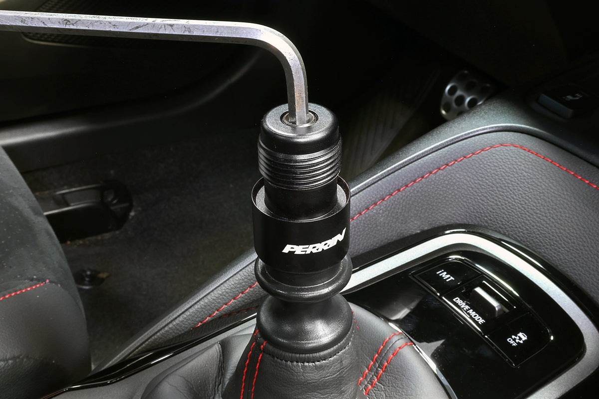 A PERRIN heavy weight stainless steel shift knob installed on a GR Corolla.