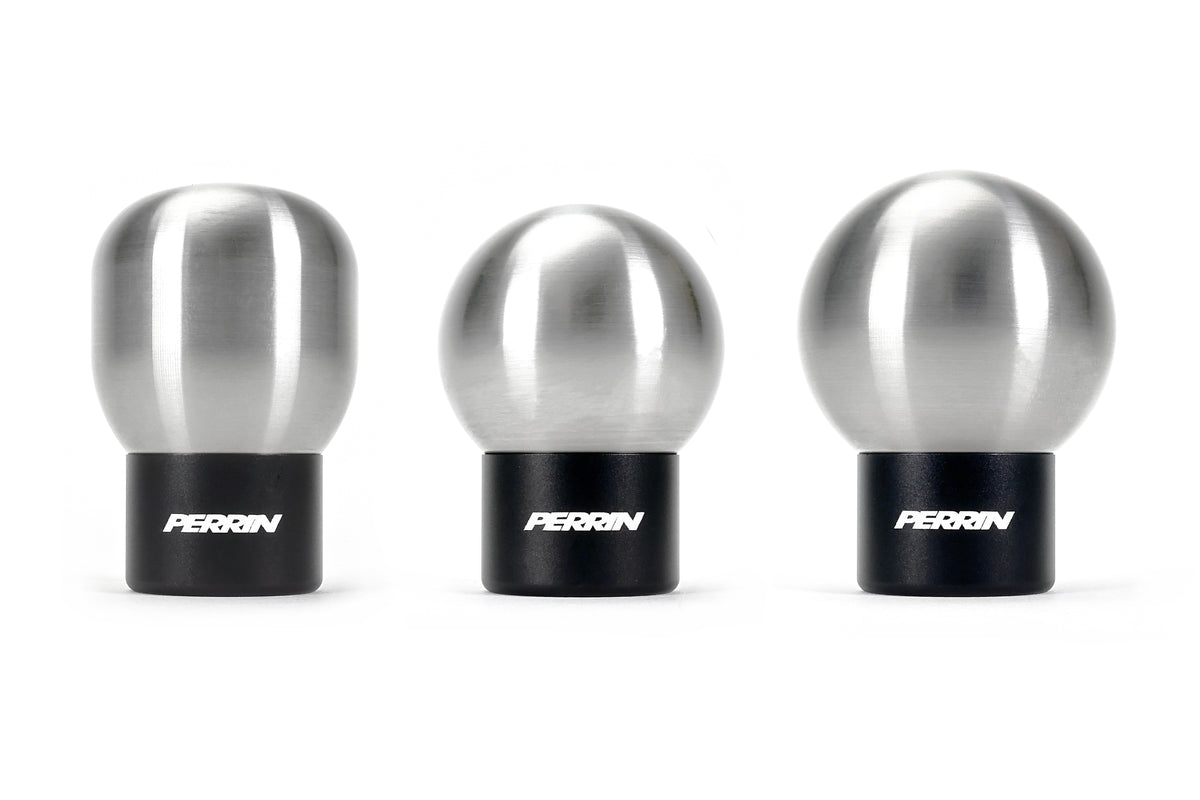 A PERRIN heavy weight stainless steel shift knob with PERRIN logo on shifter adapter.