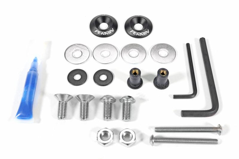 Pulley cover install kit featuring screws, washers, spacers, and tools for easy installation.