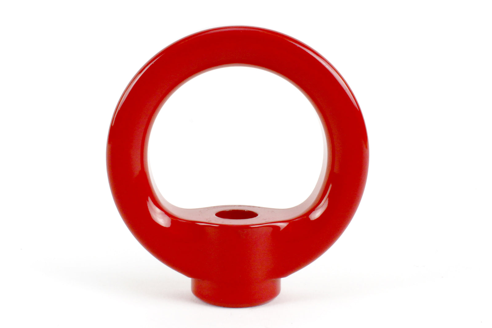 Red tow hook upgrade kit featuring a circular design for enhanced towing capability. Ideal for vehicle modifications.