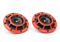 Hella Supertone Horns featuring a black center and red outer casing, designed for enhanced vehicle sound.