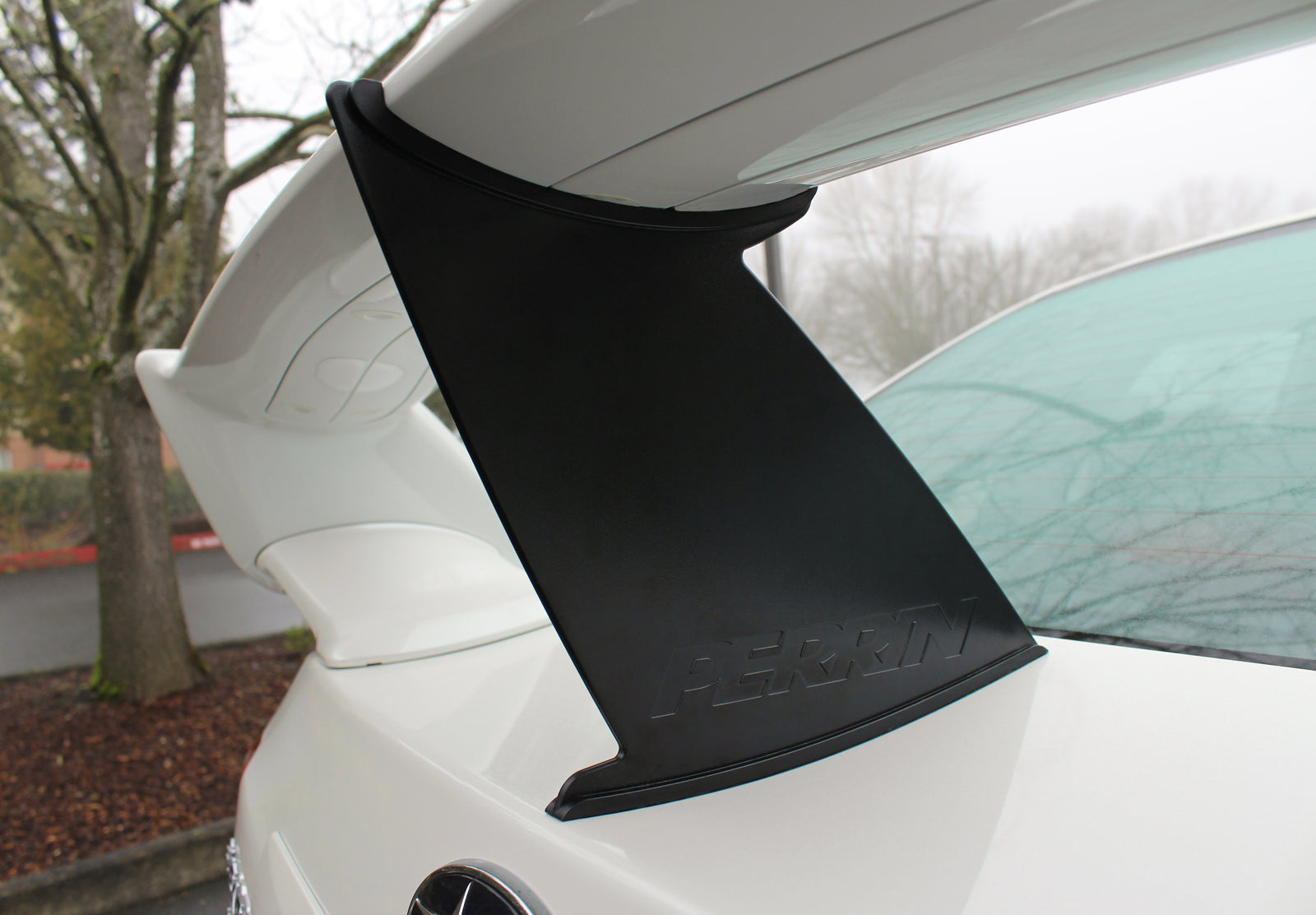 Perrin wing stabilizer for 2011-2014 STI Sedan, enhancing aerodynamic performance and stability.