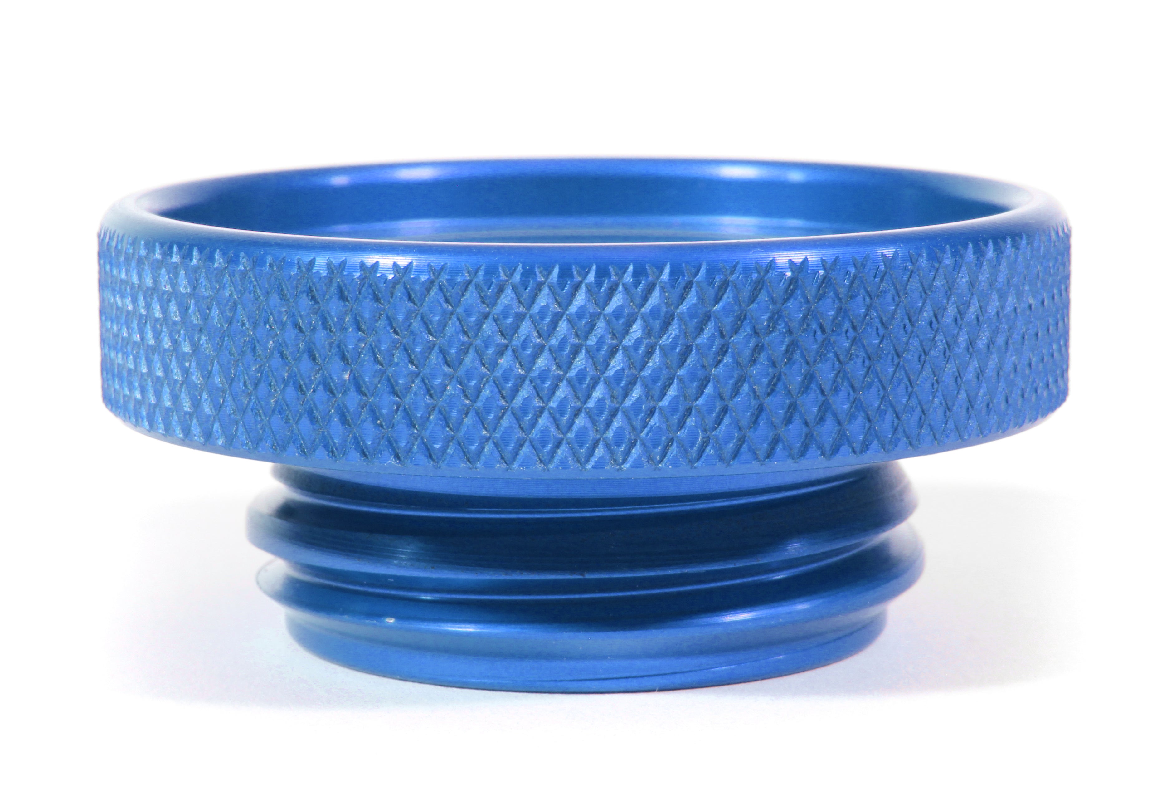 Blue anodized oil fill cap with a textured grip for easy handling, designed for performance vehicles.