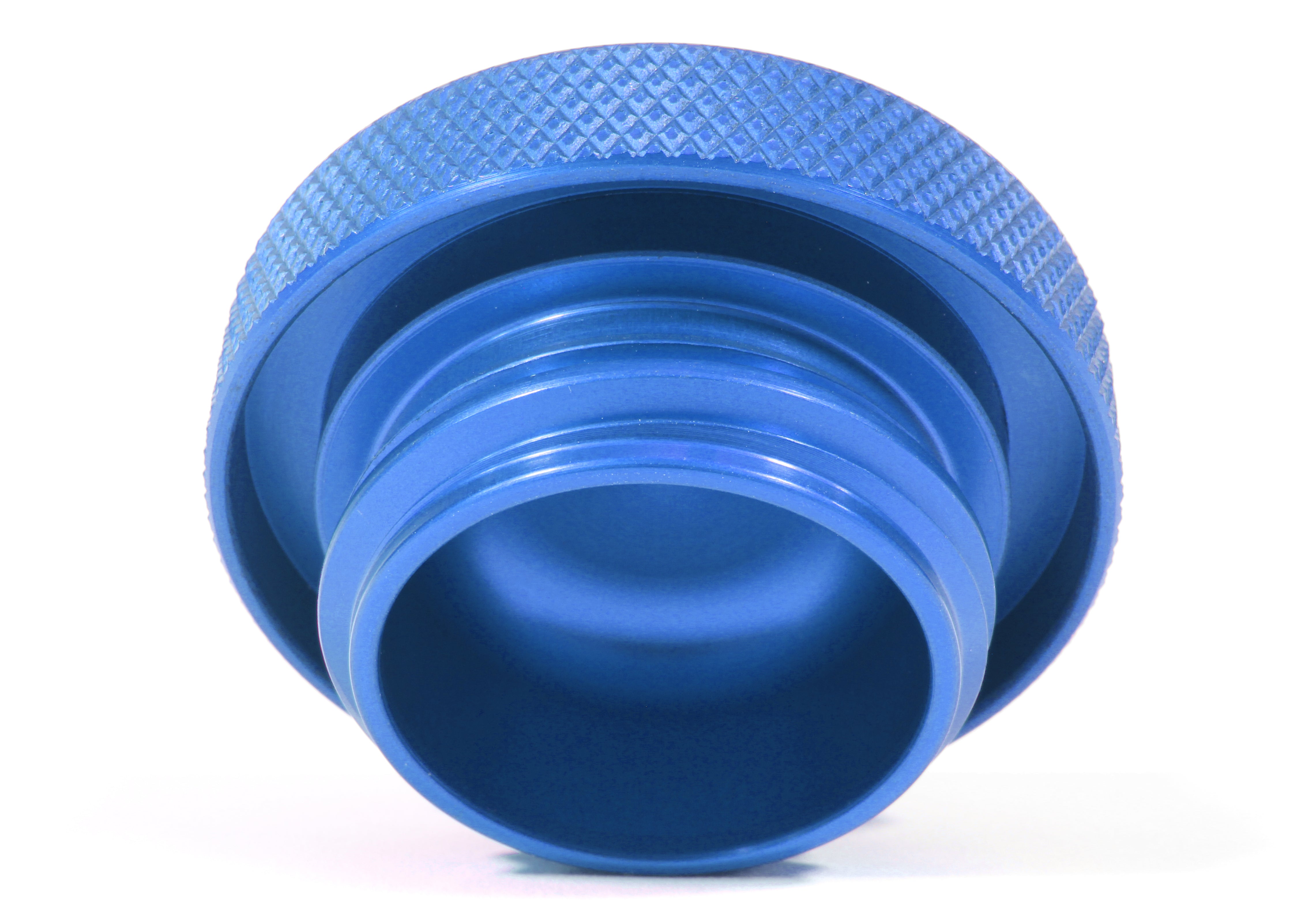 Blue anodized oil fill cap with a textured grip for easy handling, designed for performance automotive applications.