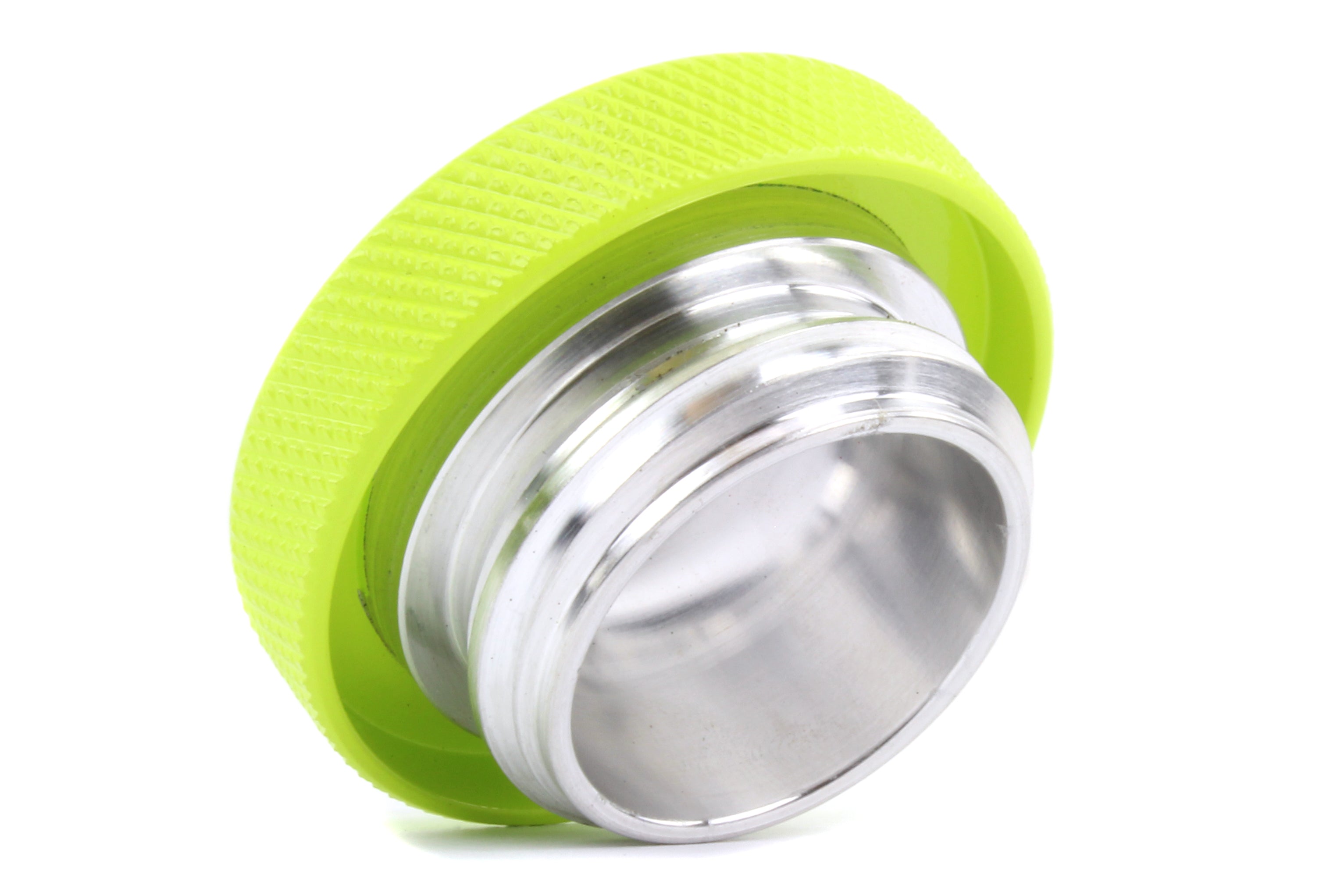 High-performance oil fill cap with a textured green grip and durable aluminum base for Subaru, Honda, Nissan, and Toyota vehicles.