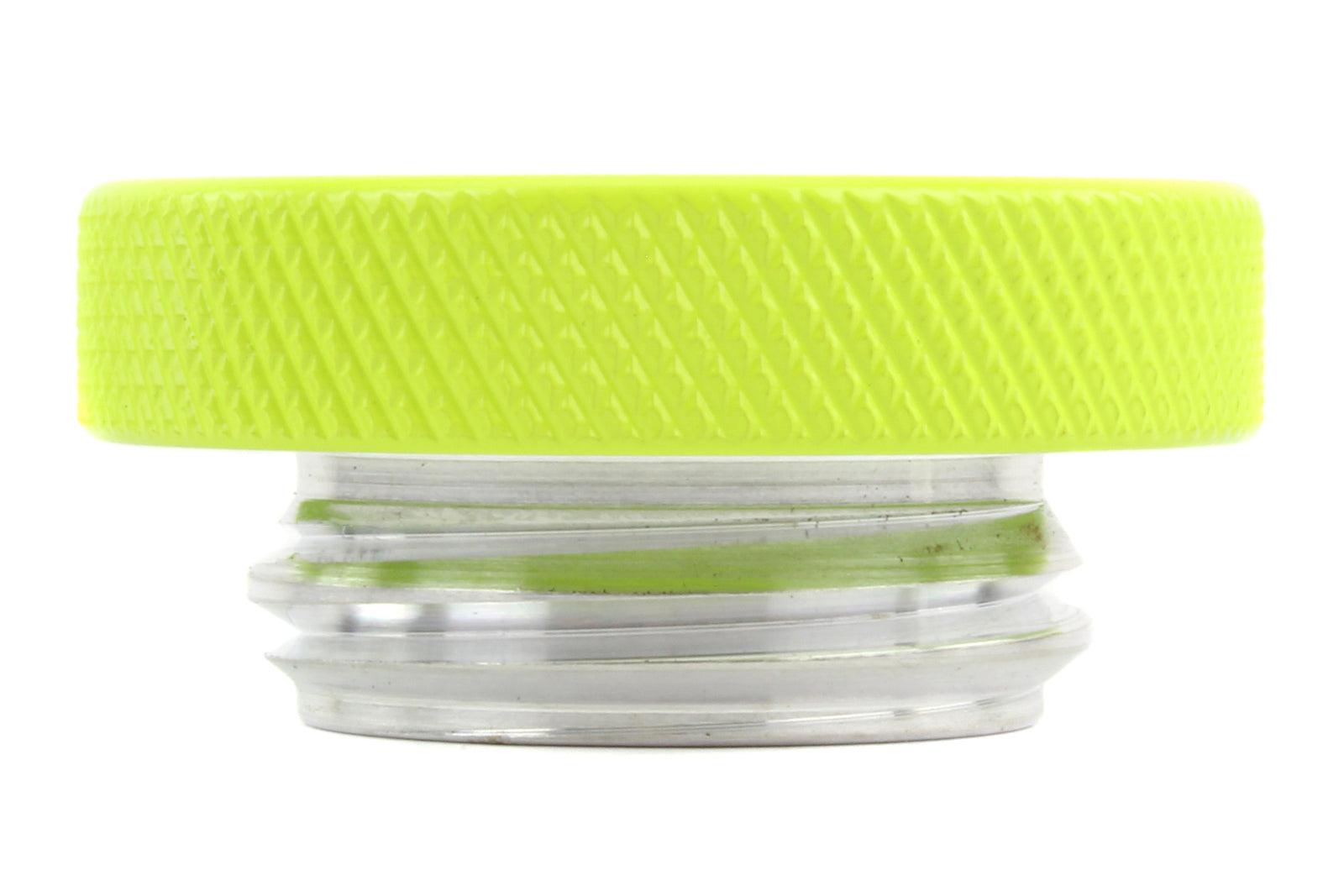 Bright yellow oil fill cap with textured grip for easy handling, designed for performance vehicles.