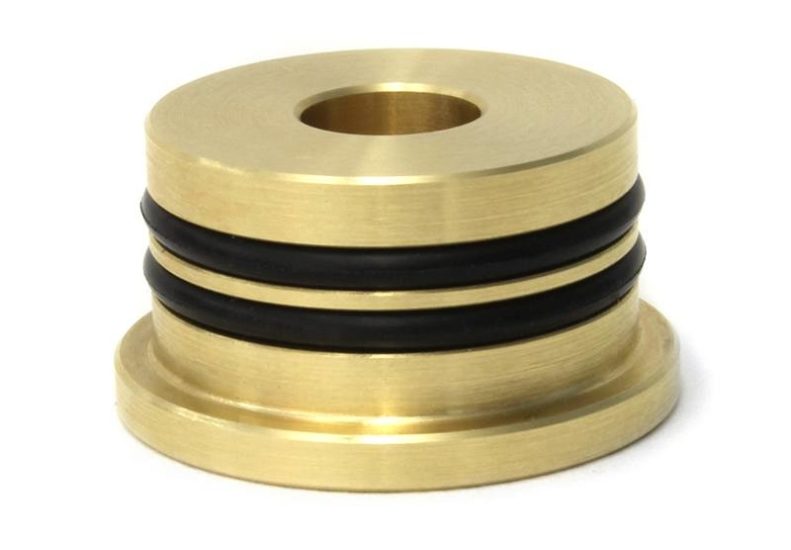 Solid brass shifter bushing with two black rubber O-rings, designed for enhanced shifting performance.