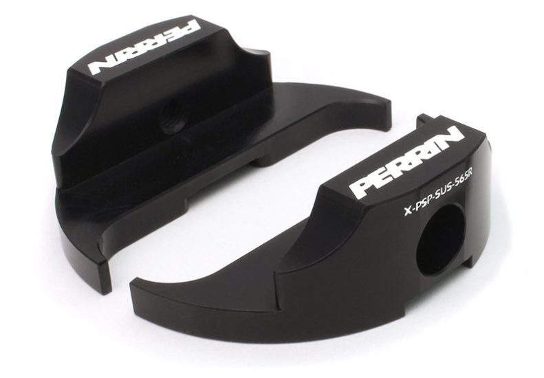Black steering dampener lockdown components with Perrin branding, designed for enhanced vehicle stability and control.